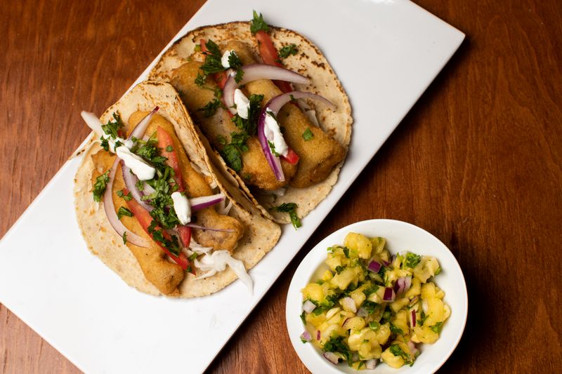Chuys al pastor tacos with pineapple and achiote