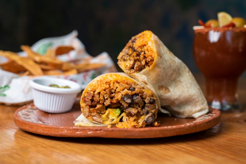 Chuys classic red sauce enchiladas with beef and cheddar